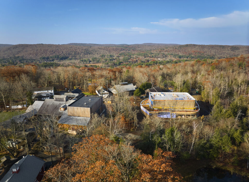 The two levels of the Doris Duke Theatre are visible through the trees as it is under construction.