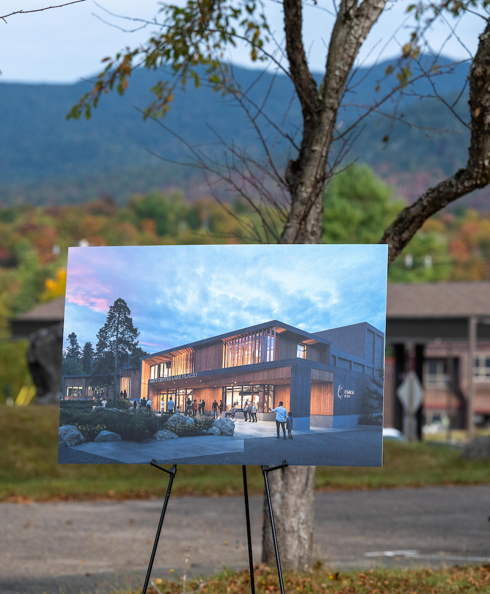 Render of the renovated exterior of Arts Center Lake Placid, on a display outdoors in the Adirondacks.