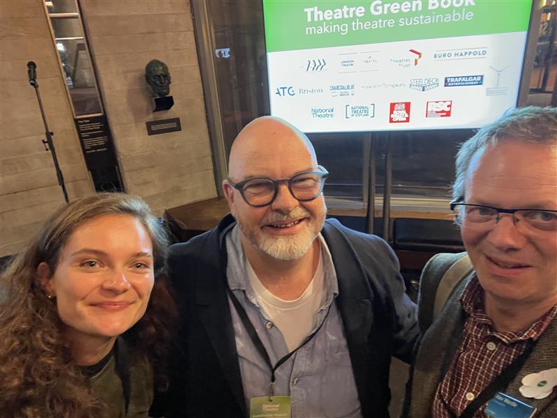 Team members pose for a photo at Theatre Green Book meeting.