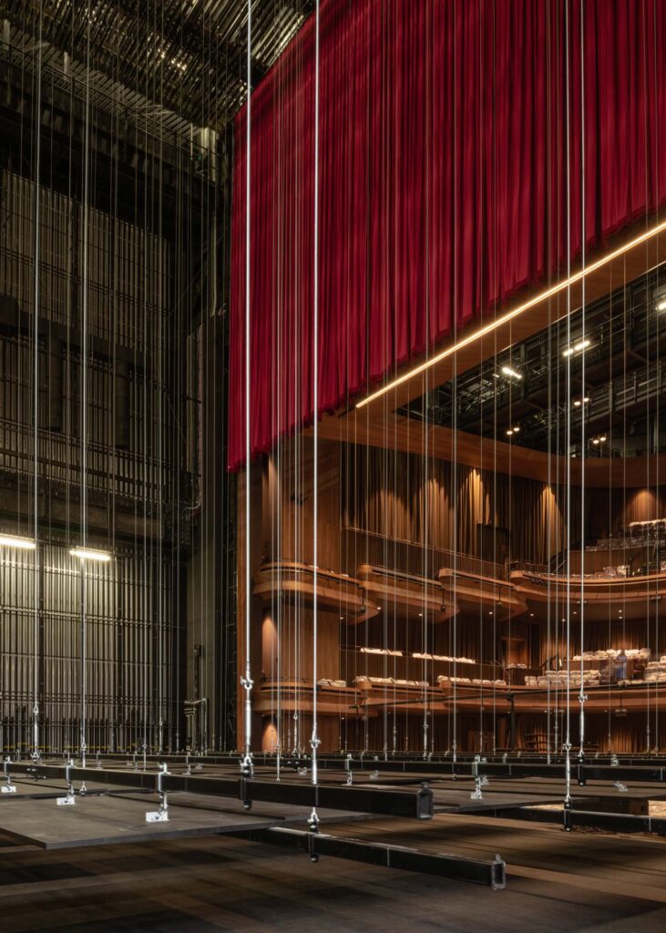 Bars lowered to the stage on ropes and cables. Photography courtesy of Jasmax.