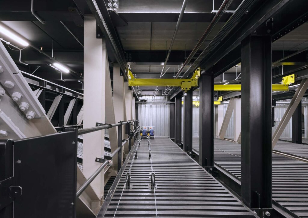 View of technical equipment with cables and cranes.