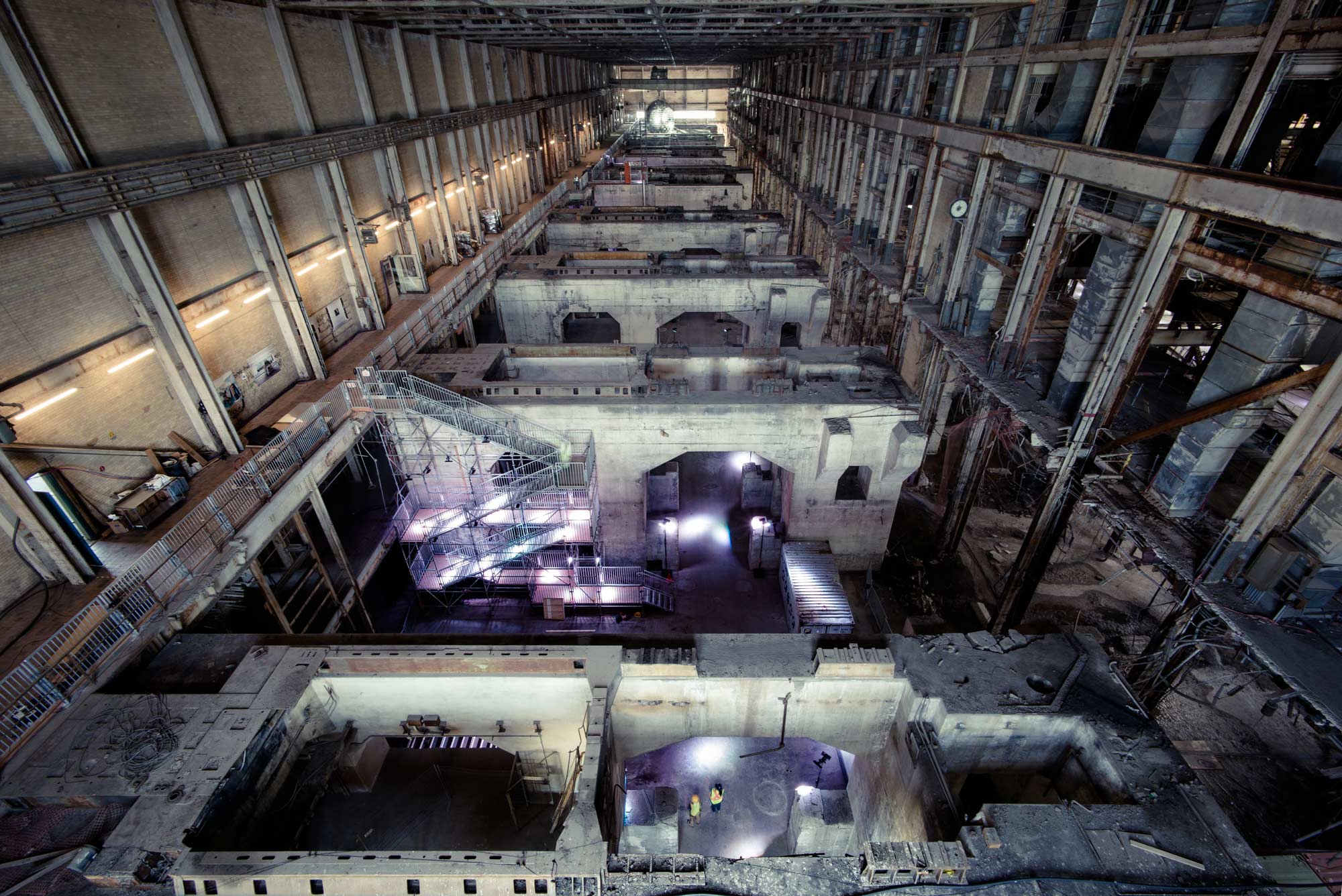 Elevated view of wall structures dividing the long space.