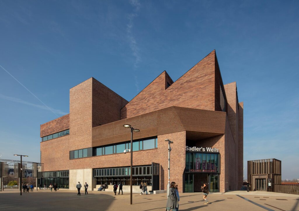 The brick exterior Sadler's Wells with jutting triangular roof. © Nick Kane