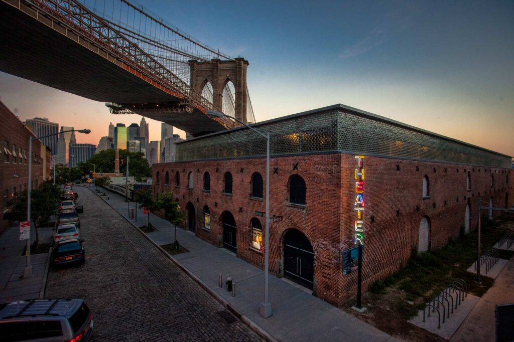 A view of the Tobacco Warehouse from across the street at dusk.