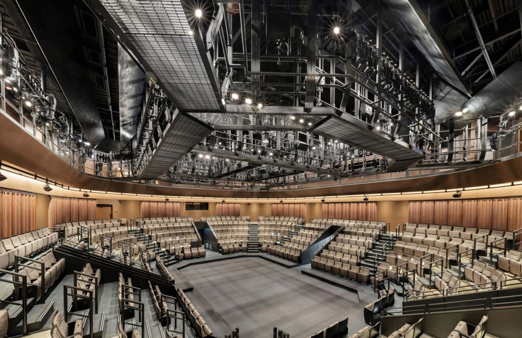 The seating area surrounds the performance area, with catwalk above, at Steppenwolf Theatre.
