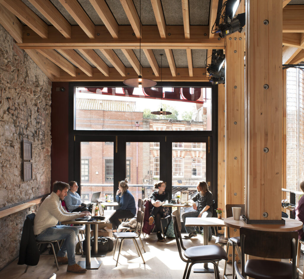 Patrons relax with a coffee in one of the new rest areas. Image: Philip Vile.