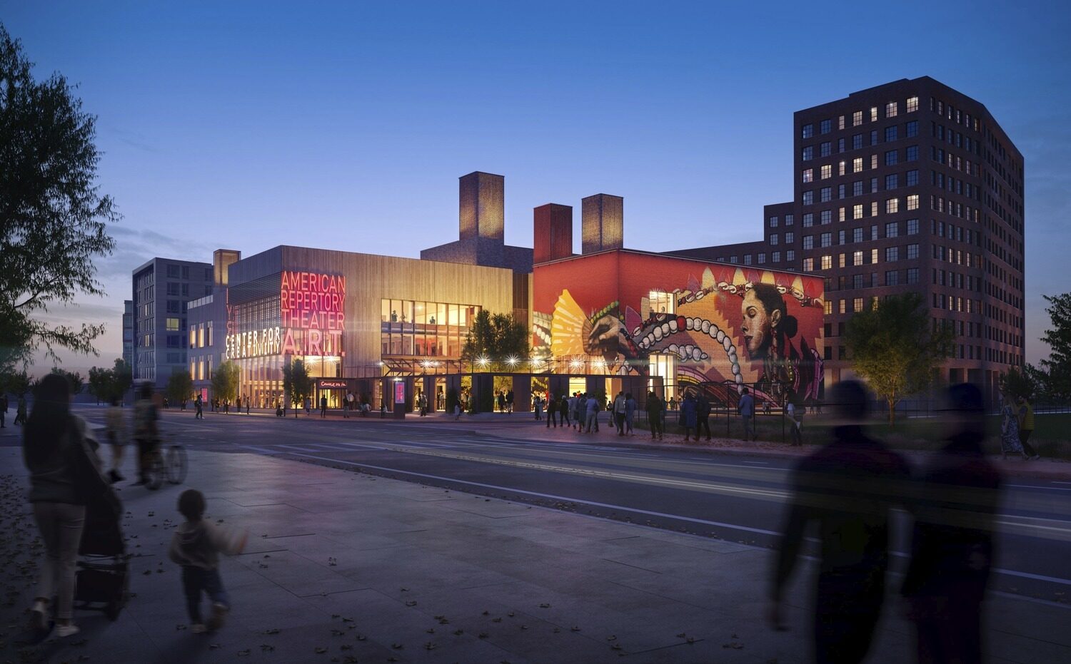 Street view of night of a large mural beside a building with red illuminated sign, 