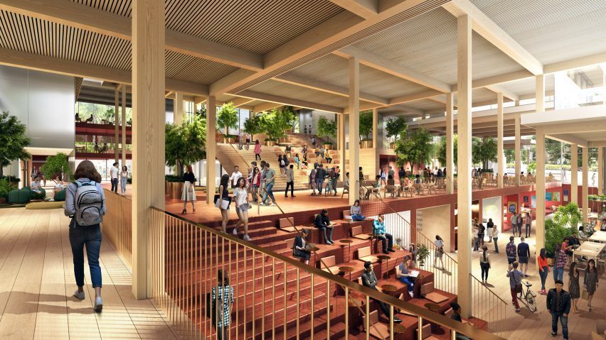 Seating area and stairwell seen from balcony level. Trees are growing indoors. Render courtesy of BIG