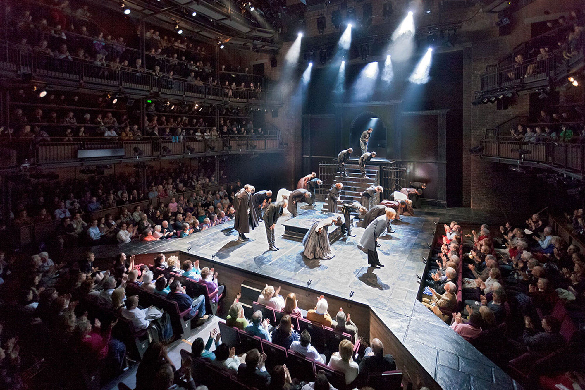 The performers bow to the audience.