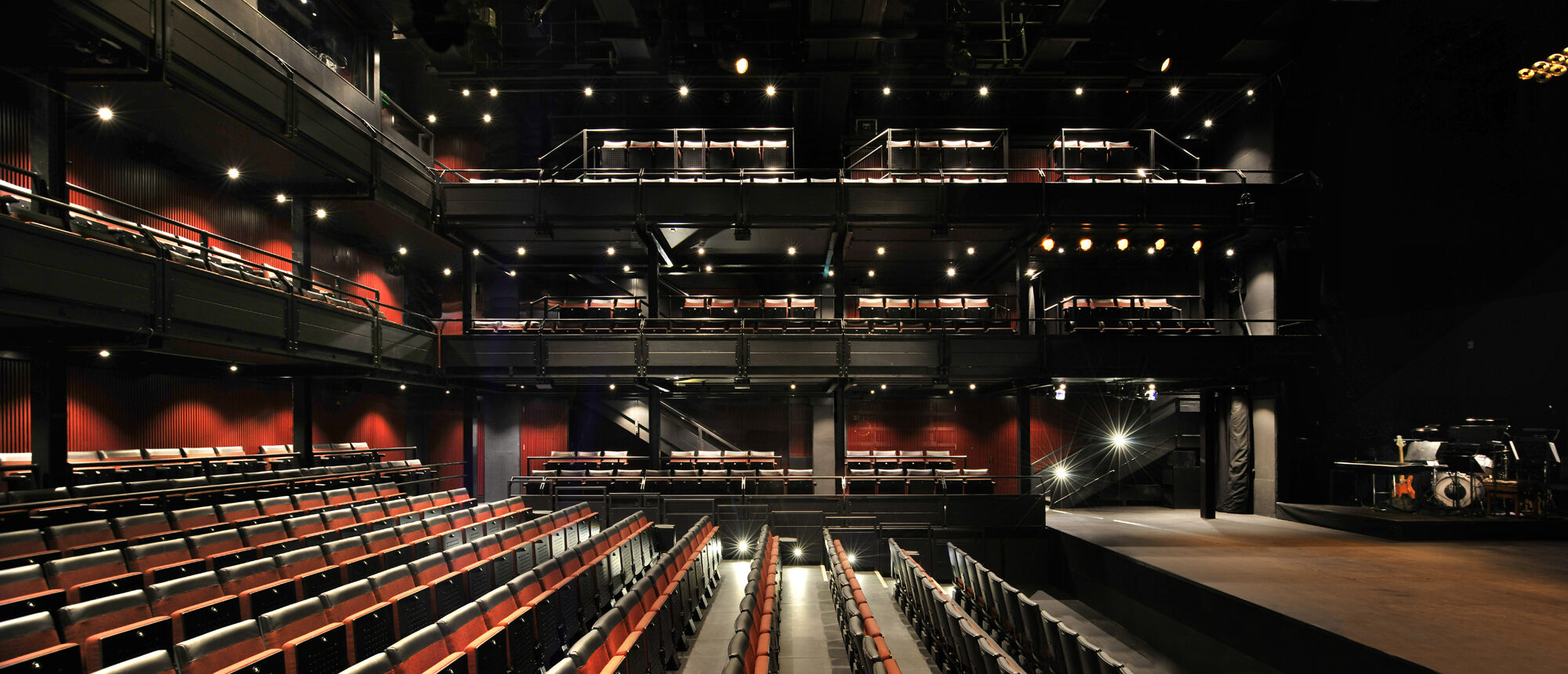 A view across the central seating area toward the balcony levels.