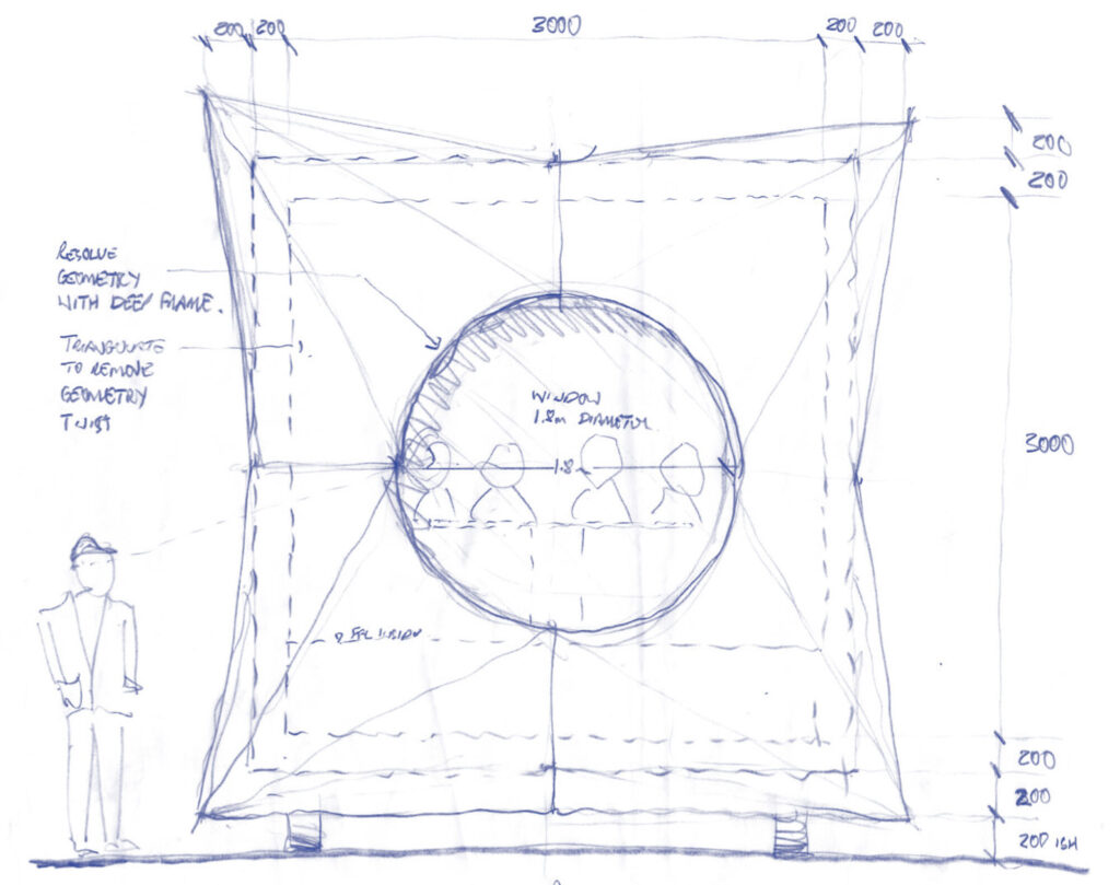 A pencil sketch showing the dimensions of the cube, angular outer structure and inner frame.