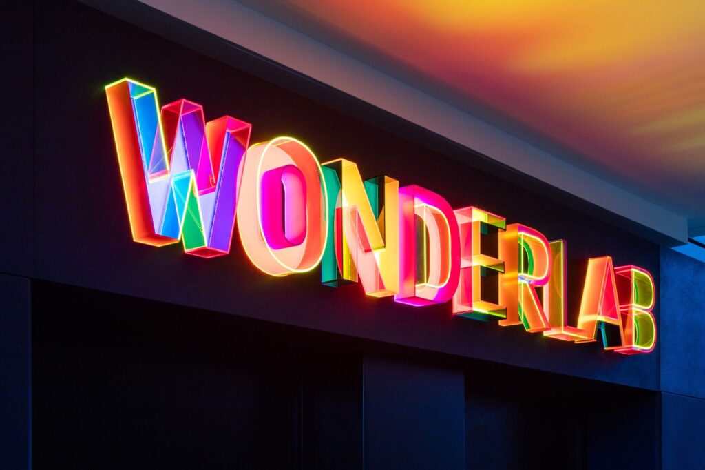 Illuminated, prismatic "Wonderlab" sign.
