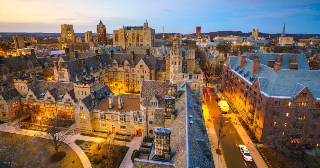 Aerial view of stone buildings on the Yale campus.