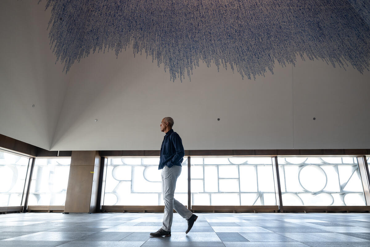 President Barack Obama walks through the Obama Presidential Center in Chicago, IL on Wednesday April 8, 2026.